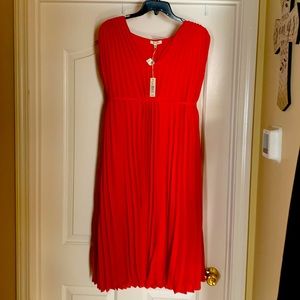 Red dress mid length . Has tags size XL.